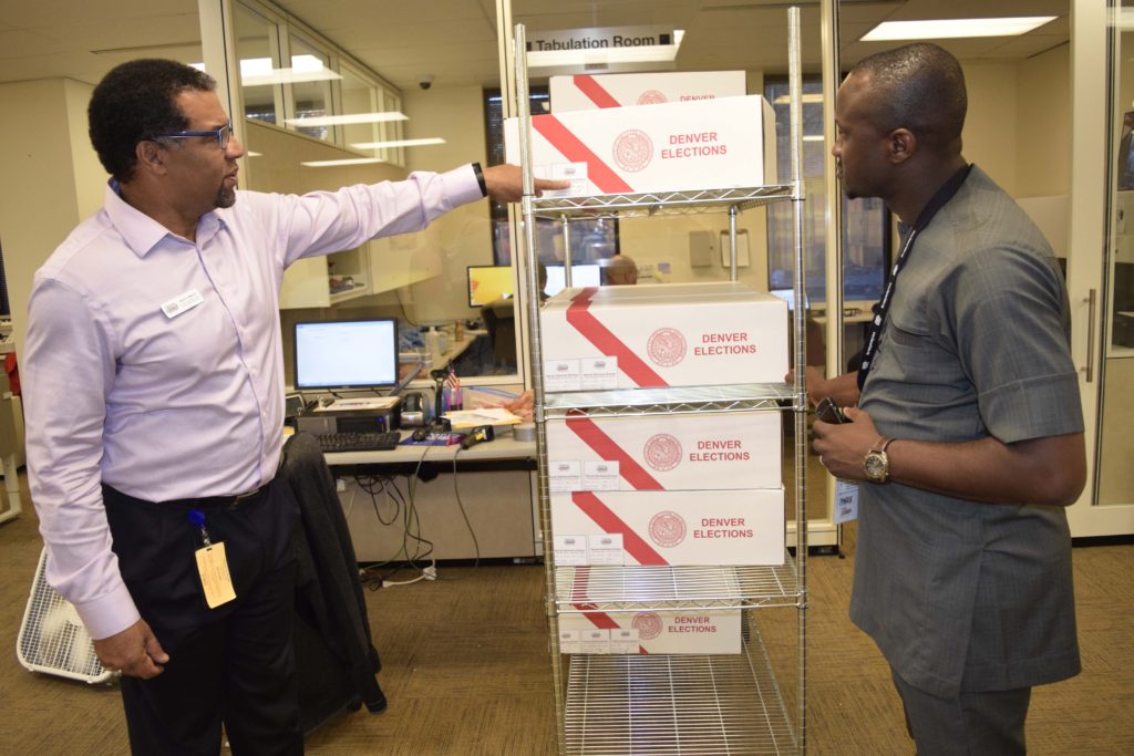 The Senior Public Information Officer of Denver Election Division, Alton Dillard II, taking our team on a tour of the Election Division Office